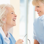 caregiver and client laughing banner