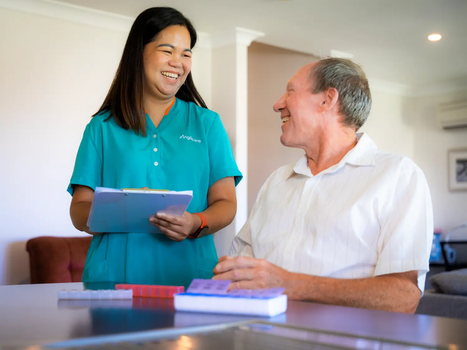 Nursing staff helping with medication assesment.