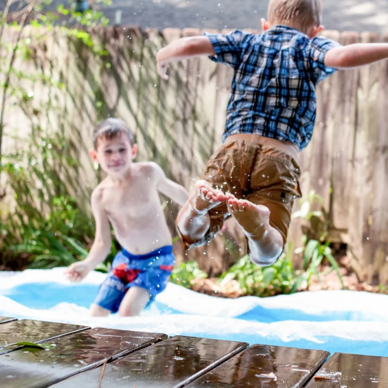 Two boys having fun playing outside