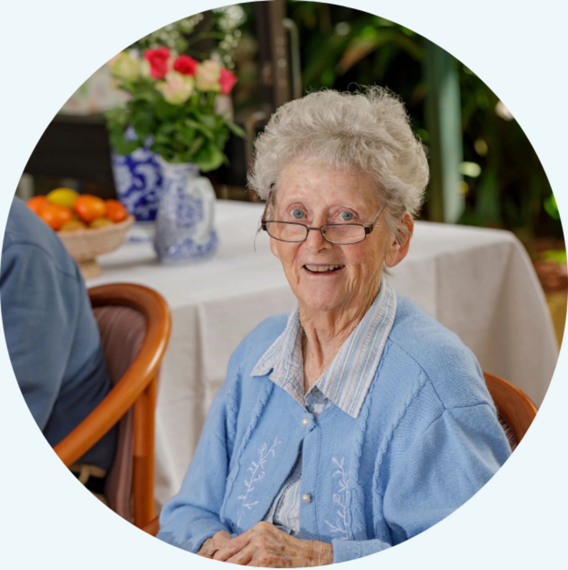 Image of St Martin's resident at dining table