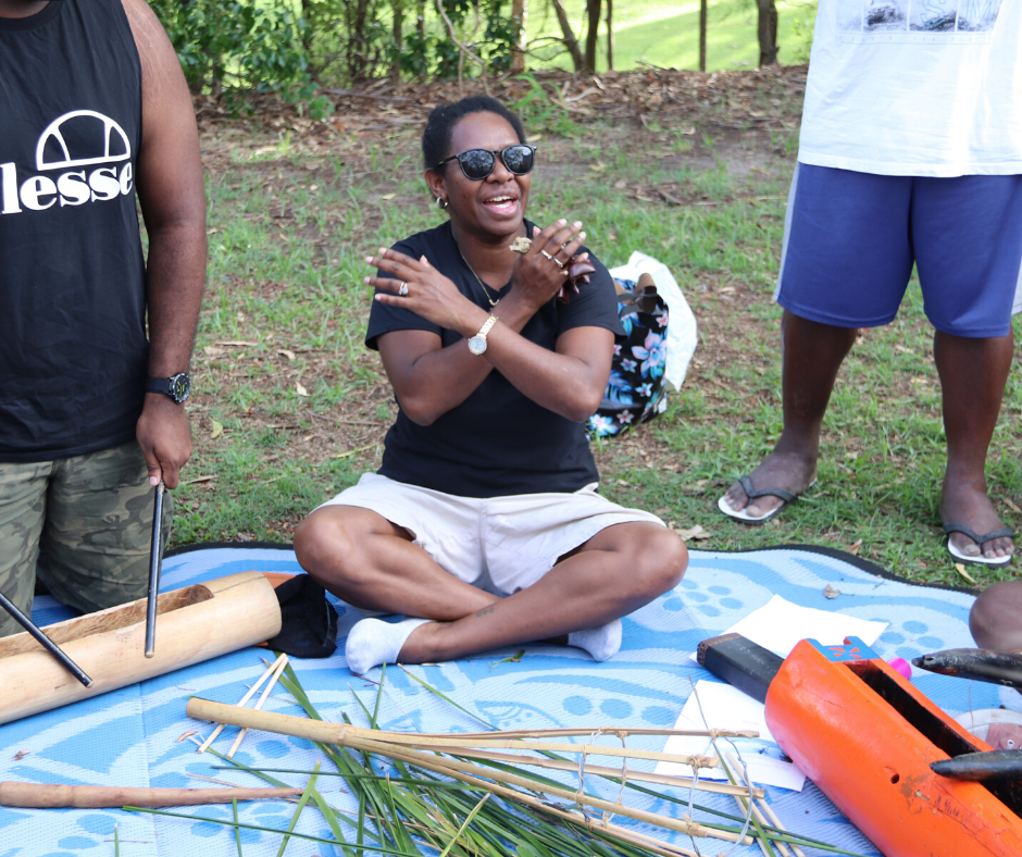 Lady facilitating a group exercise at a Jarjums event