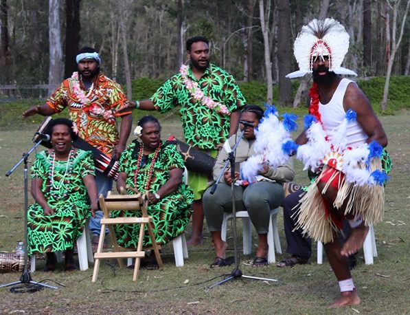 Aboriginal and Torres Strait Islander people posed for a picture at a Naming Ceremony