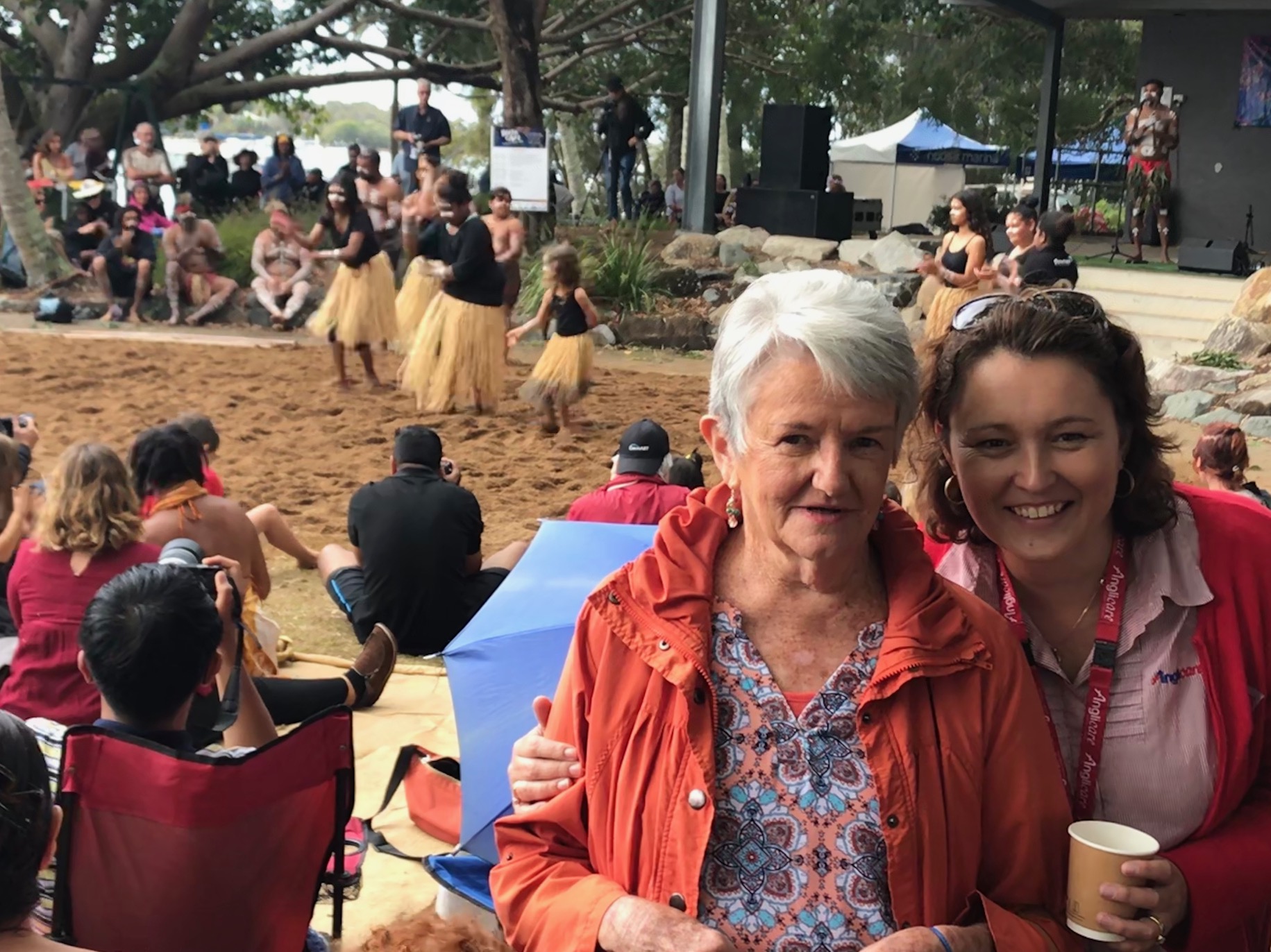 Staff member and client posed for photo at the Booin Gari Festival