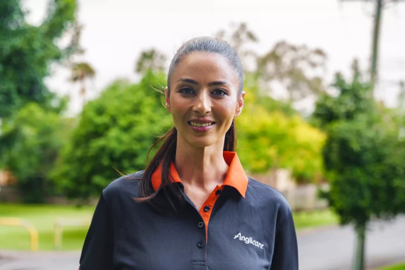 Anglicare worker smiling at camera