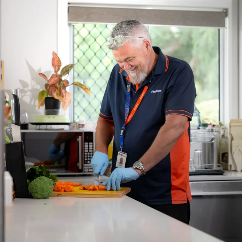 Home Care Worker meal prepping in client's home